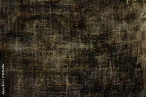 Dark brown wood scratched background, close up