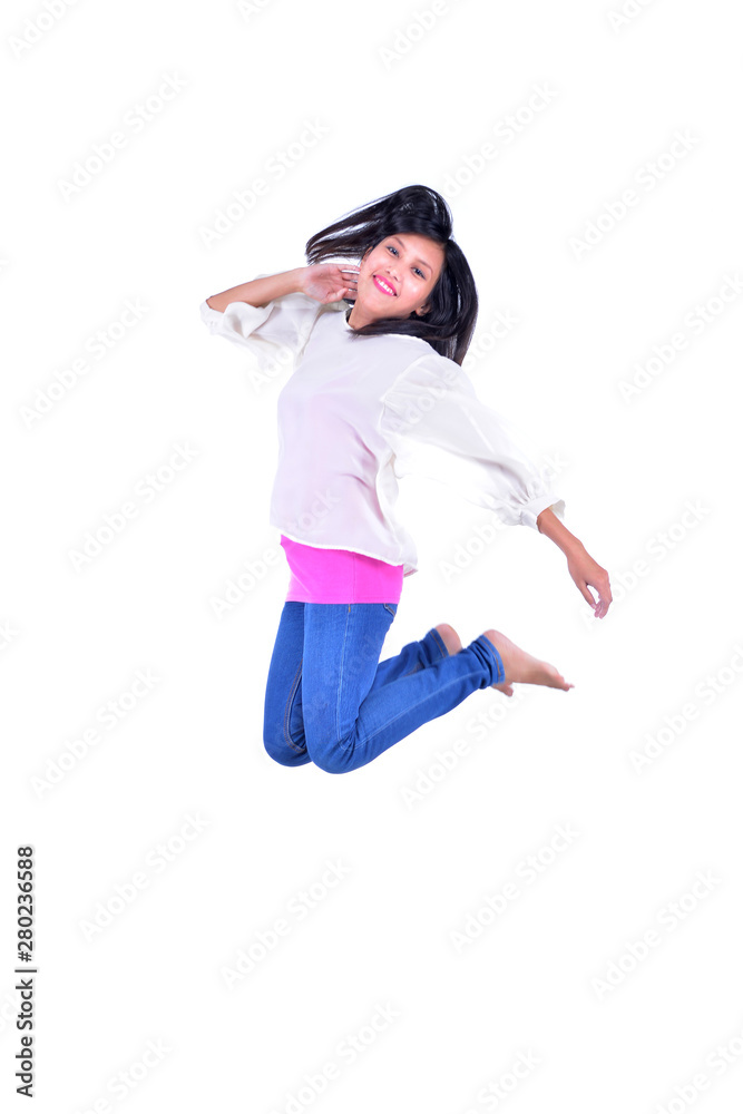 Active girl jumping in joy isolated on white Active girl jumping in joy isolated on white