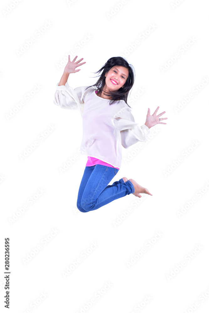 Active girl jumping in joy isolated on white