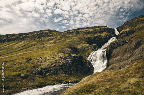 Fototapeta Naklejka Na Ścianę i Meble -  magnificent cascade waterfall at hornstrandir natural reserve westfjords iceland