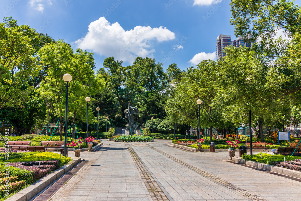 Panorama of Park Garden, Jardim Luis de Camoes with central monument. Santo António, Macao, China. Asia.
