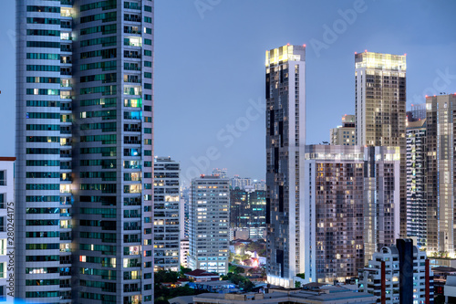 High-rise buildings in Bangkok open fire at night.
