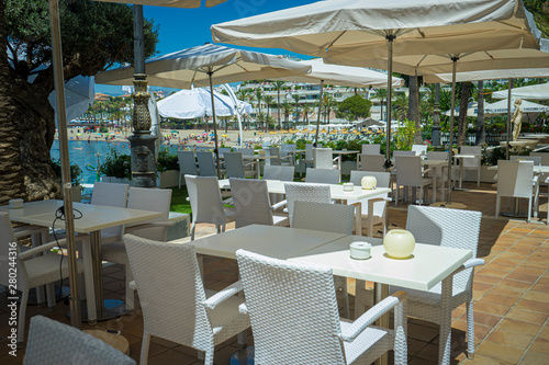 Empty tables  Resort  Sun terraces for tourists in summer in Marbella  Malaga  Spain