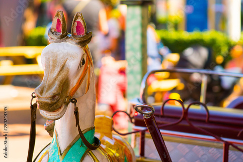 Obraz na płótnie carousel horses at the fun fair, luna park w salonie