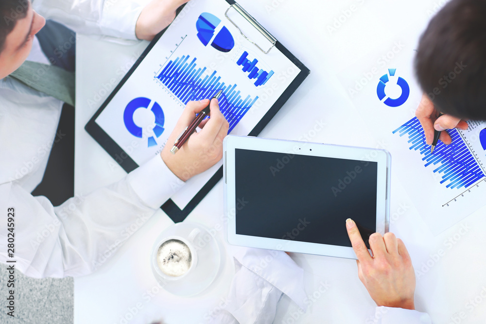 smiling female boss talking. technology and office concept smiling female boss talking. technology and office concept