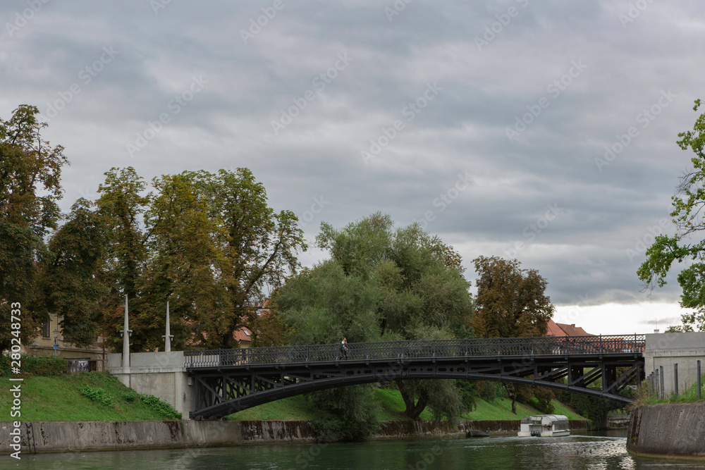 Ljubljana,Slovenia,6,2016: Street, river, bridges with dragons, magical city. Ljubljana,Slovenia,6,2016: Street, river, bridges with dragons, magical city.