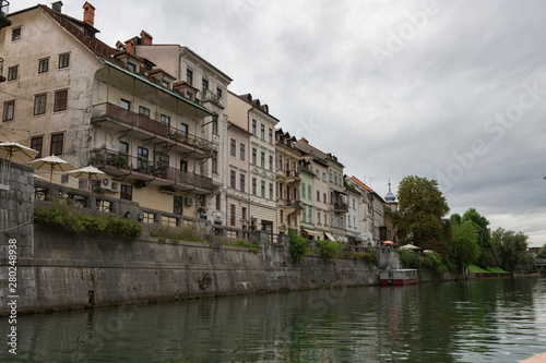 Ljubljana,Slovenia,6,2016: Street, river, bridges with dragons, magical city.