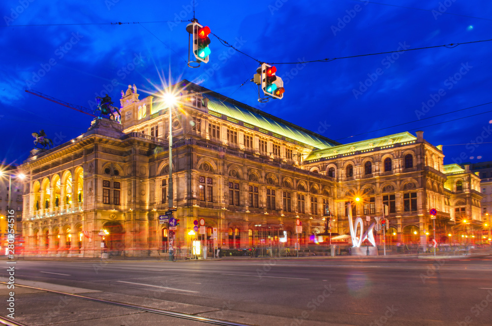 Vienna opera house landmark with long exposure photography during the night cloud moving