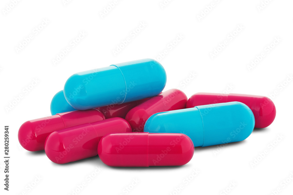 Pile of medical pills in red and blue colors on white isolated background with shadow.