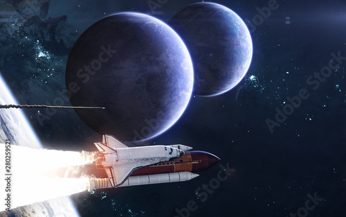 Fototapeta Naklejka Na Ścianę i Meble -  Space Shuttles flying away from deep space planet. Exoplanets in blue light. Science fiction. Elements of this image furnished by NASA