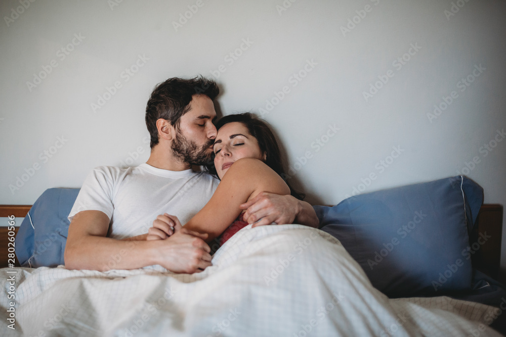Young romantic couple in bed Young romantic couple in bed