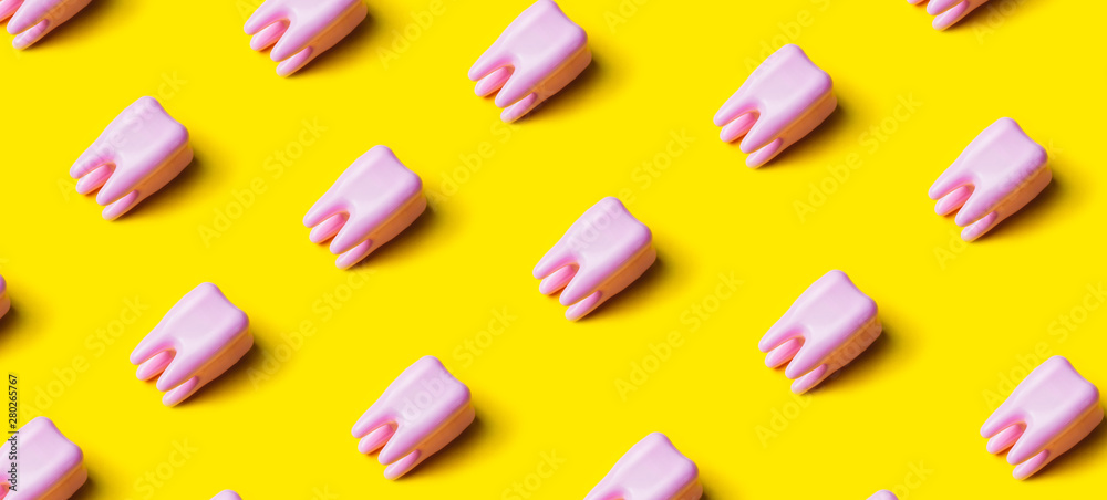 Teeth pattern on yellow bright background. Top view. Teeth pattern on yellow bright background. Top view.