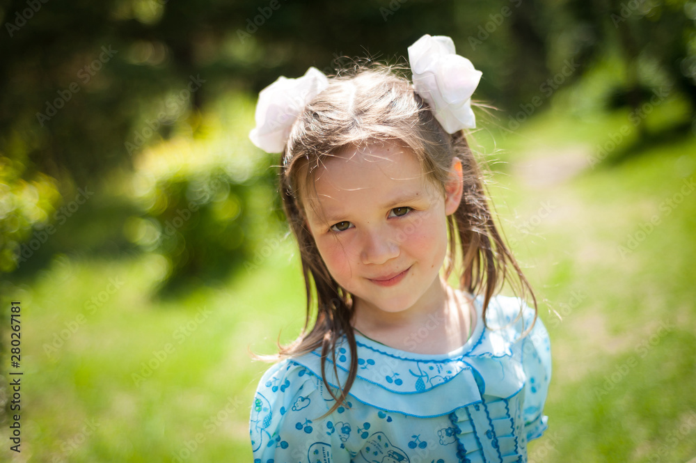 cute little girl having fun walking in a Sunny Park cute little girl having fun walking in a Sunny Park