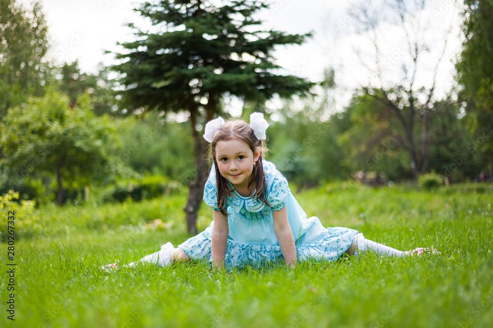 cute little girl having fun walking in a Sunny Park cute little girl having fun walking in a Sunny Park