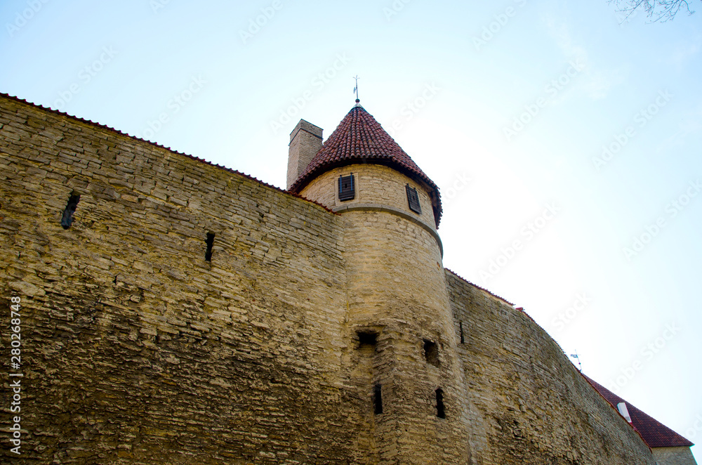 old tower of the castle and old stone wall