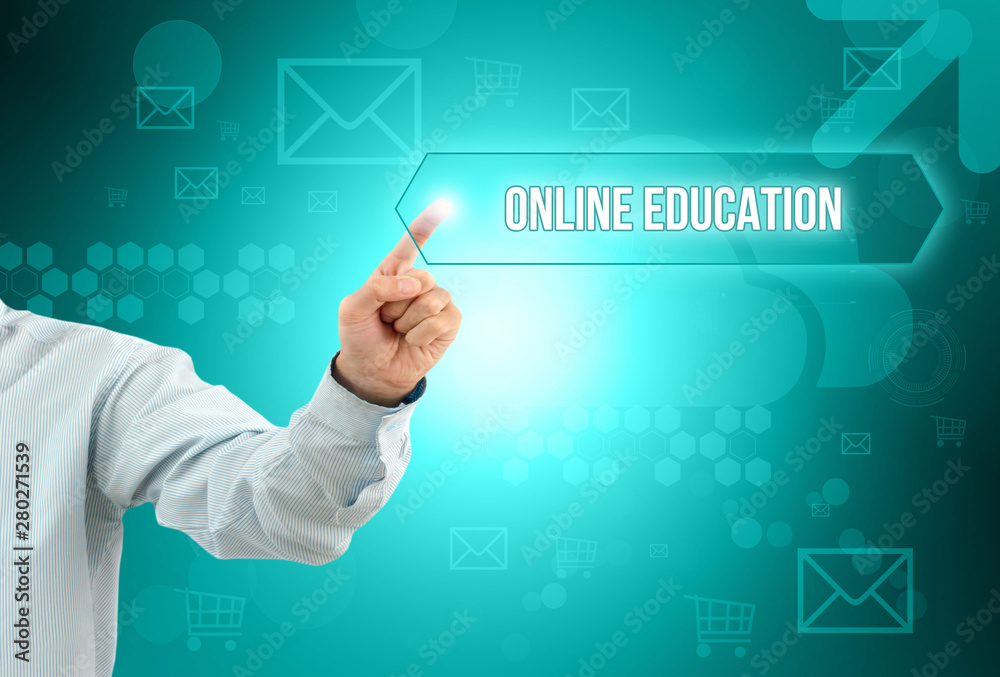 Obraz premium Business man touch a button on an imaginary screen. ONLINE EDUCATION CONCEPT