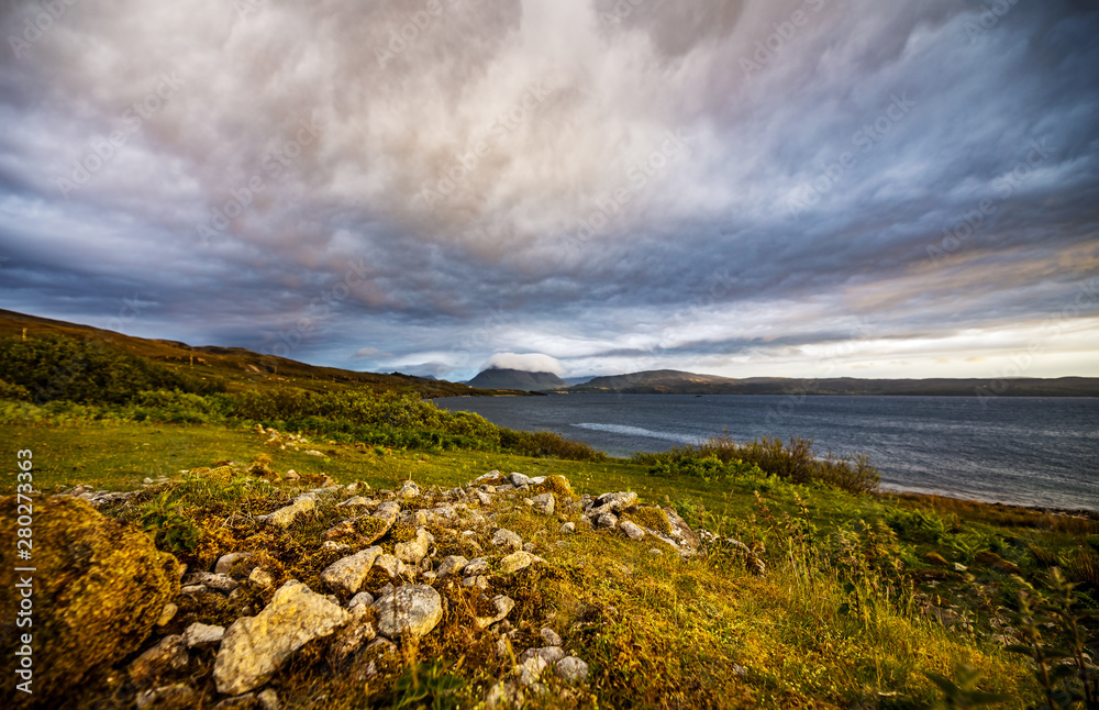 Beautiful scenic landscape of Scotland nature with beautiful evening cloudy sky.