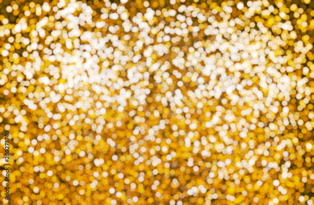 Dark glitter abstract bokeh pattern. Yellow christmas background. Dark glitter abstract bokeh pattern. Yellow christmas background.