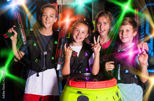 Teen kids with laser guns