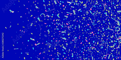 Colorful colored confetti on a blue background.