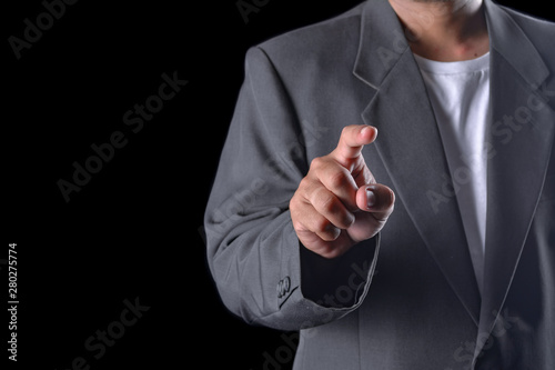 Business man with pointing to something or touching a touch screen