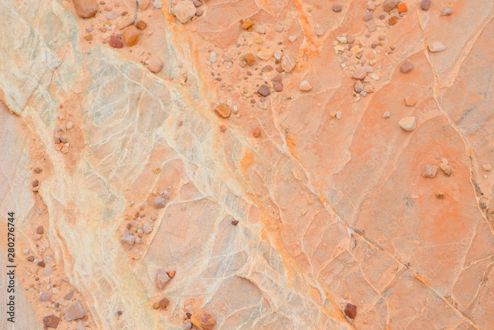 ピンク、黄色、オレンジの砂岩テキスチャー、背景