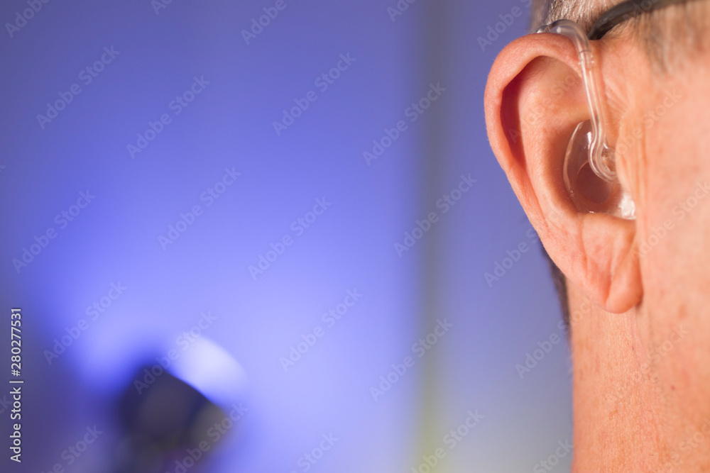 Fototapeta premium Man with hearing aid
