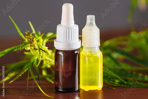 Bottle of CBD cannabis oil. Health marijuana with cannabidiol content. Pharmaceutical hemp drug preparation with safe cannabinoids