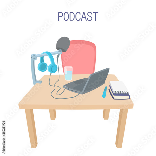 Podcast table with computer, microphone and headphones. Home podcast studio. Recording studio.
