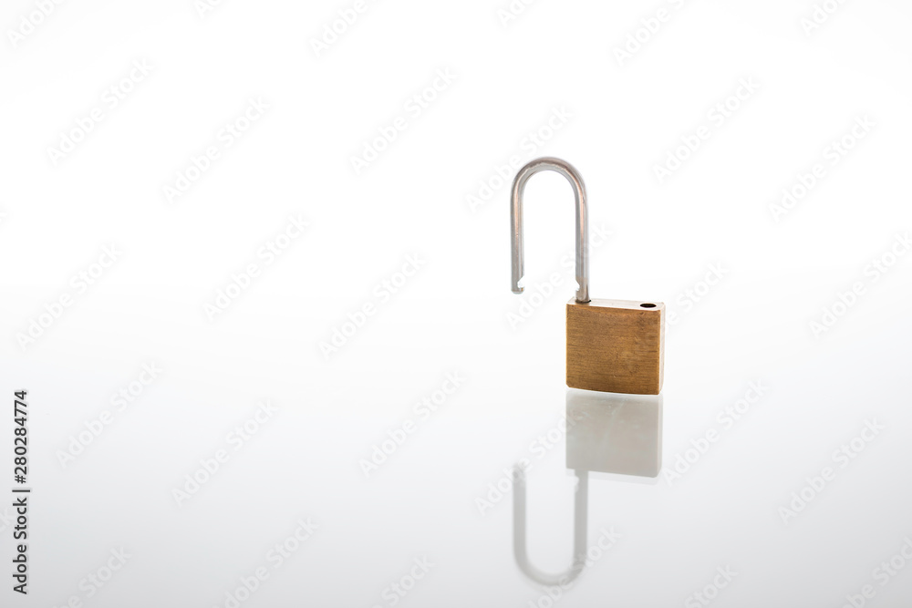 Unlocked and opened padlock as security or privacy concept, isolated on white background with reflex Unlocked and opened padlock as security or privacy concept, isolated on white background with reflex