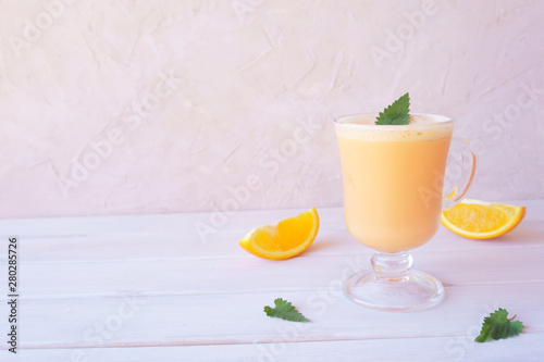 orange smoothie, milkshake with orange and mint
