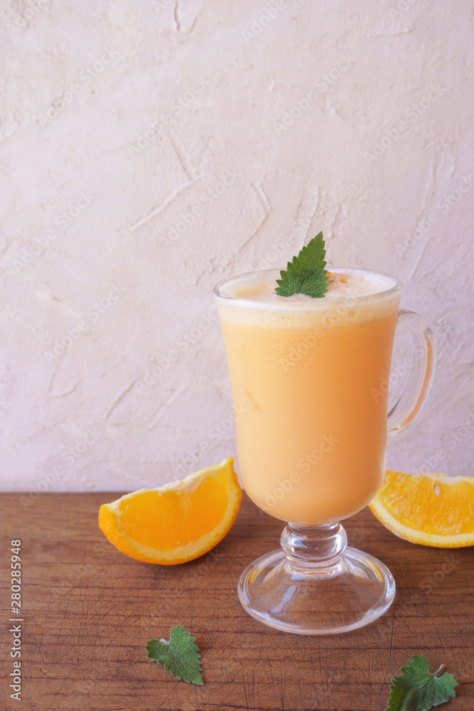 orange smoothie, milkshake with orange and mint