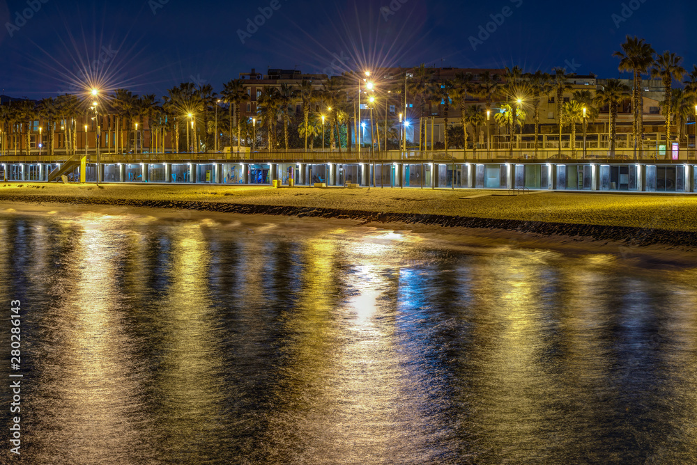 Serene, beautiful evening on La Barceloneta beach Barcelona Catalonia Spain