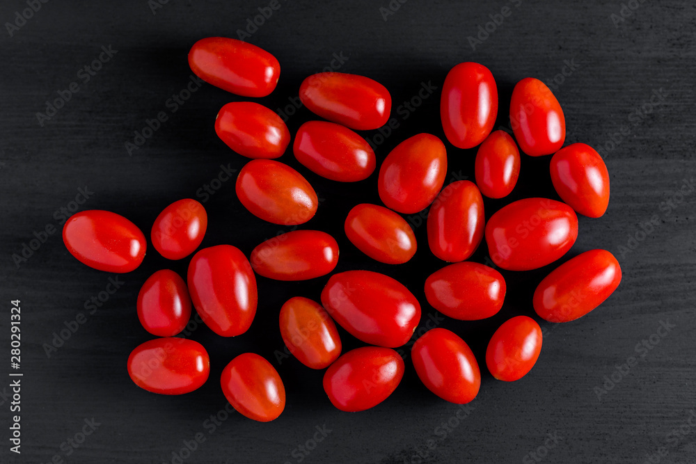 Cherry Tomatoes on a black background Cherry Tomatoes on a black background