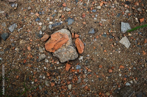 Orange stone detail on ground, abstract nature background,full flame image.