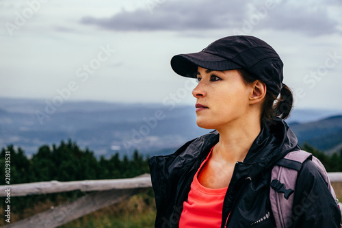 Young woman on the trail in Giant Mountains (Karkonosze), authentic travel experience.  © marcinjozwiak