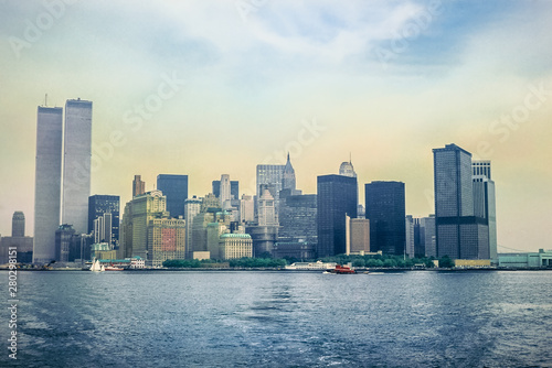 Archival and historical cityscape of New York skyline from Hudson River with World Trade Center featured as landmark of the Twin Towers. Lower Manhattan in NYC  United States.
