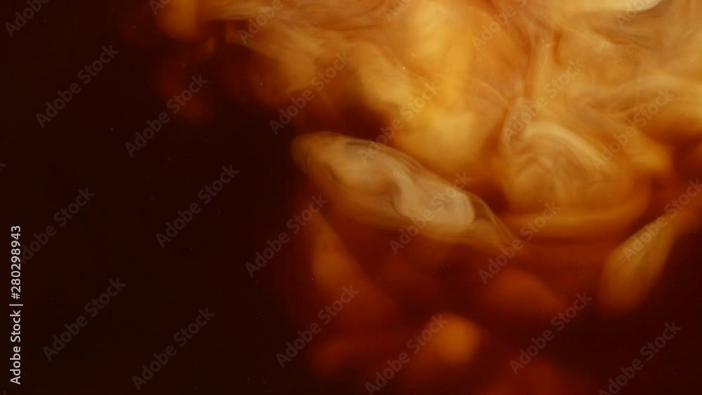 Super slow motion of pouring milk into coffee drink. Filmed on very high speed cinema camera