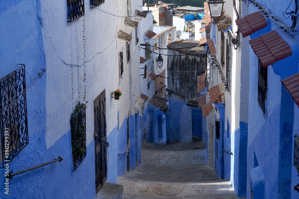 Blue street in old medina of the Chefchaouen town in Morocco.