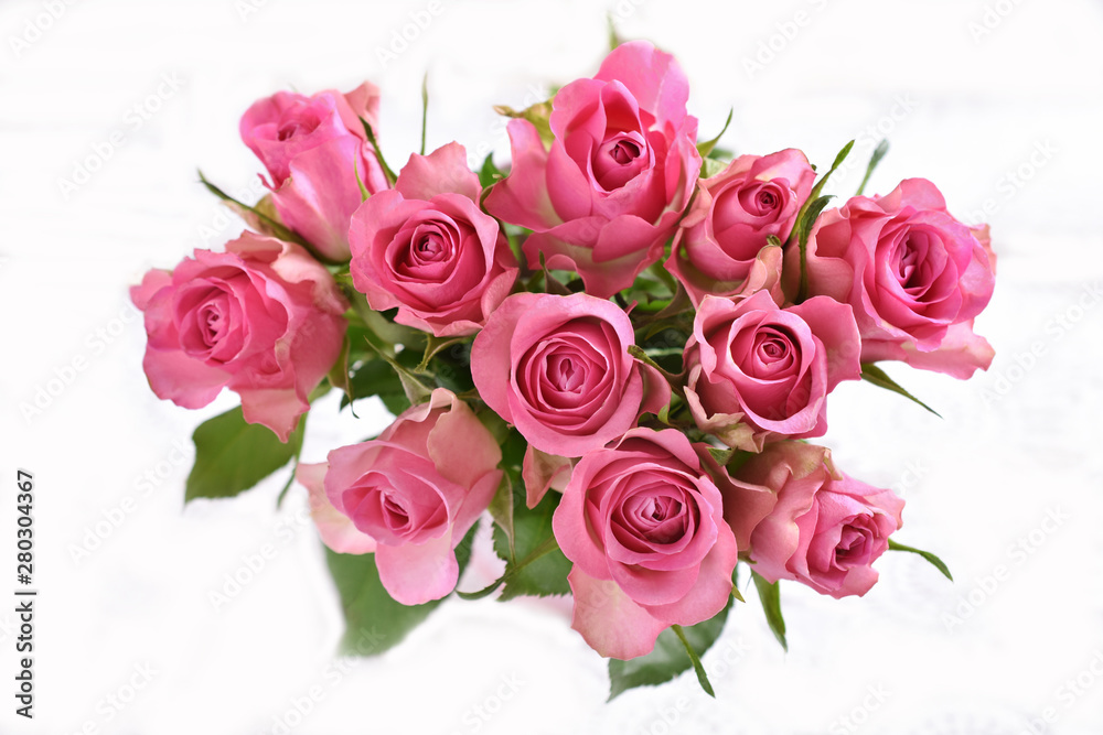 top view of  the bunch of pink roses isolated on white