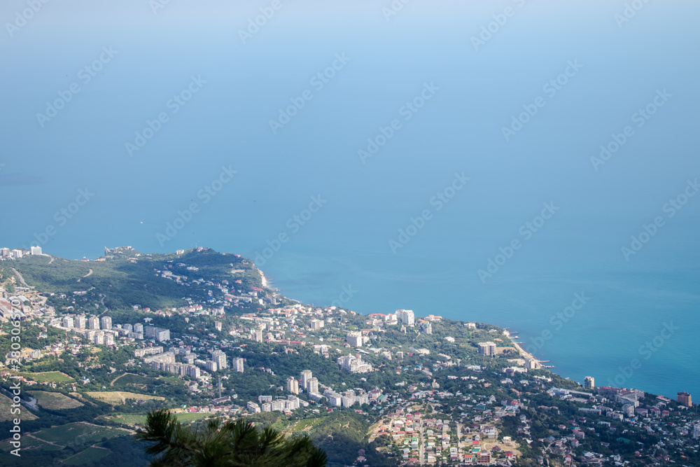 Black Sea view from Ai-Petri mountain. Light sunny summer day, Crimea, Yalta, Russia.