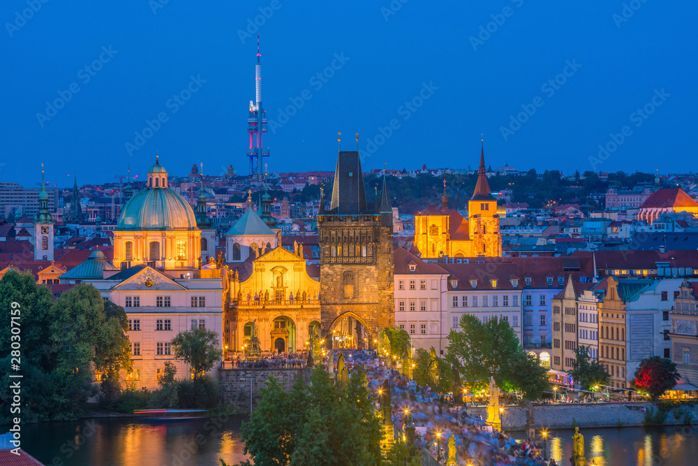 Famous iconic image of Charles bridge and Praguecity skyline