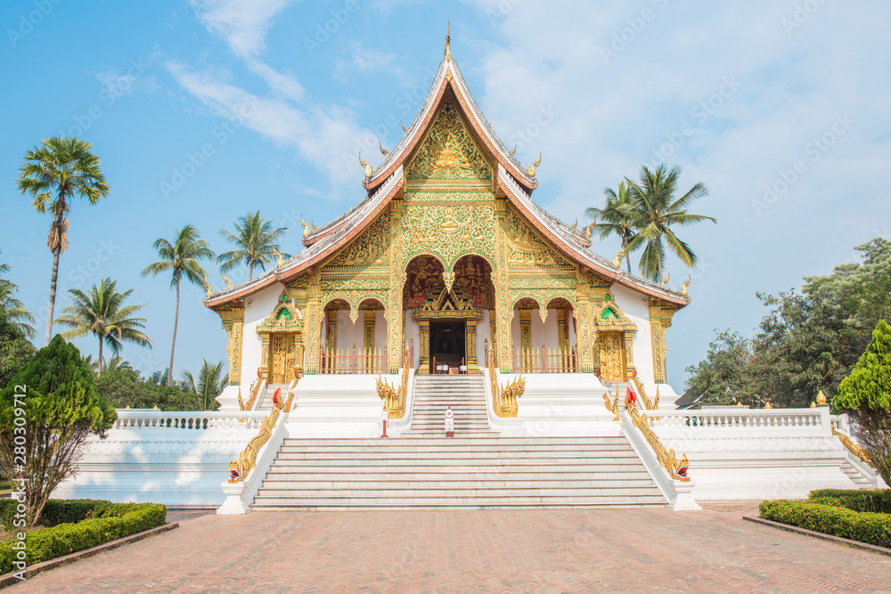 An iconic Buddhist temple in the royal palace of Luang Prabang, the UNESCO world heritage site in north central of Laos. An iconic Buddhist temple in the royal palace of Luang Prabang, the UNESCO world heritage site in north central of Laos.