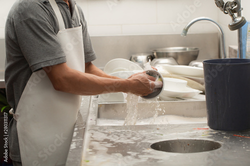 Man washing dish