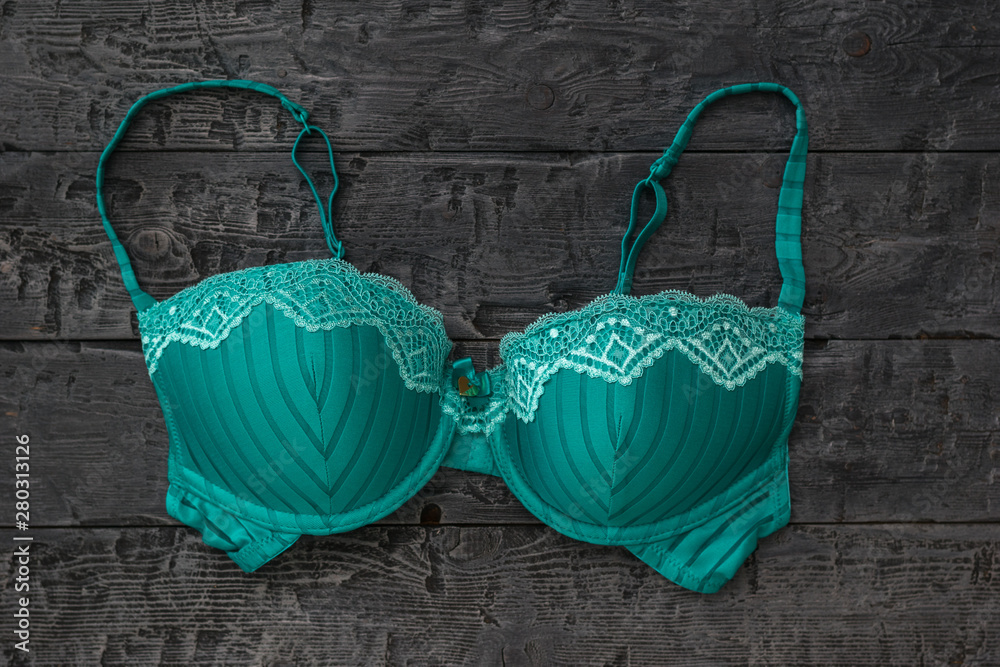 custom made wallpaper toronto digitalBeautiful light green bra on wooden background.