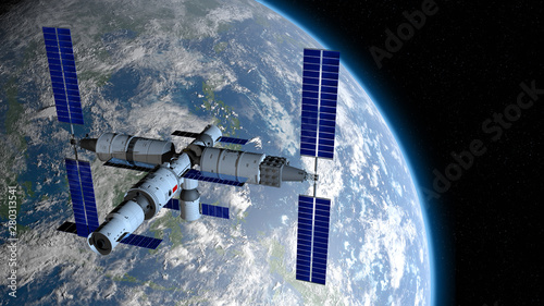 TIANGONG 3 - Chinese space station orbiting the planet Earth on black space with stars background. 3D Illustration photo
