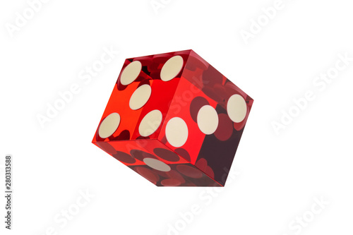 Close-up of one red dice with faces of five, three, one. Professional cube isolated on a white background without a shadow.