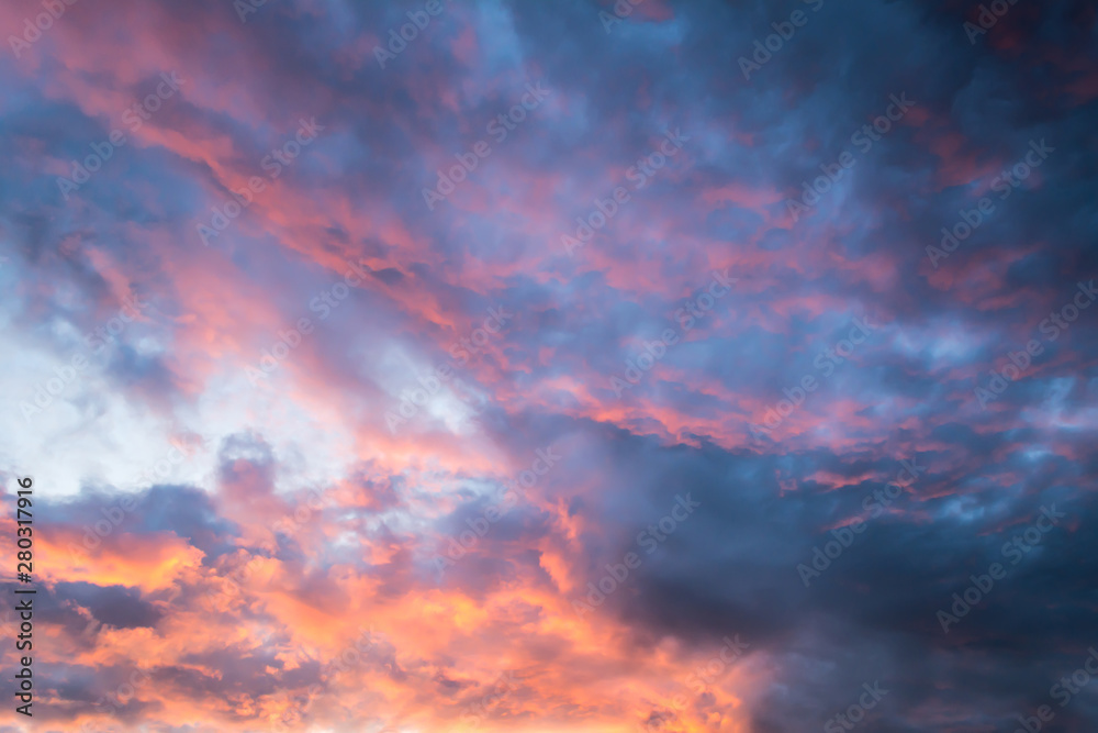 Beautiful sky with multicolored clouds at sunset.