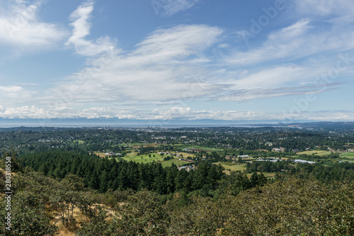 Aerial panoramic view of the city of Victoria from mount Douglas park with a beautiful Pacific Ocean scene. © olegmayorov