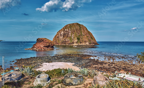 The cape of Mui Yen with volcanic rock outcrops offshore, Phu Yen province central Vietnam